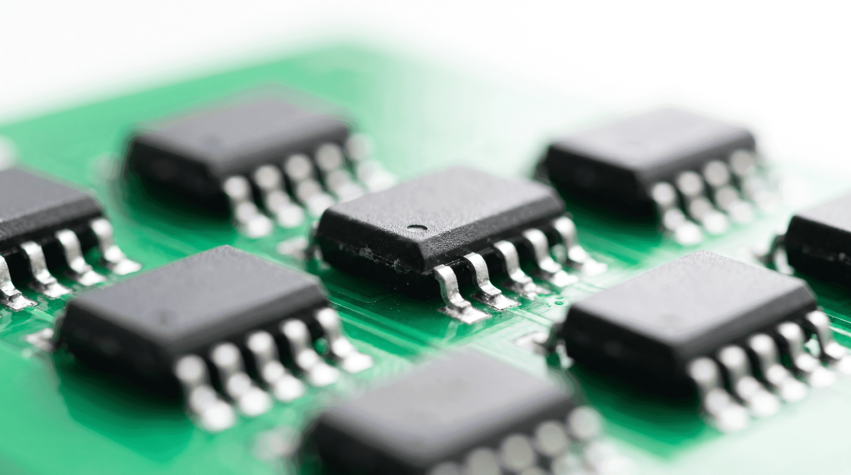 Macro of black integrated-circuit chips on a printed circuit board